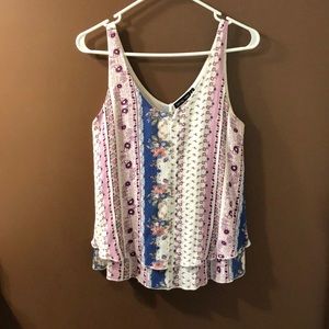 Printed tank top with layered hem.